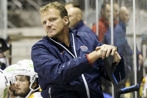 Biel&#039;s Head coach Kevin Schlaepfer with his walking stick looks on his players, during the Swiss Ice Hockey Cup round of 32 game between Star-Forward and EHC Biel-Bienne, at the ice stadium des E ...