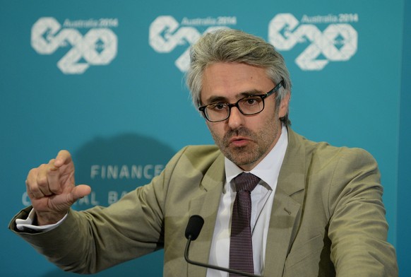 epa04096814 Pascal Saint-Amans, Organisation for Economic Co-operation and Development (OECD) Director of Tax, speaks to members of the media at a press conference during the G20 Finance Ministers and ...