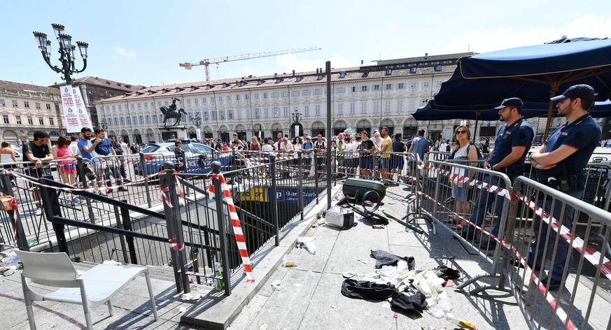epa06009686 The railing of a staircase access to the San Carlo underground car park which collapsed during the stampede in Turin, Italy, 04 June 2017. More than 1,500 people were injured when panic sw ...