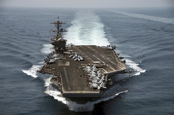 epa08335877 (FILE) - An aerial handout image made available by US Navy showing the aircraft carrier USS Theodore Roosevelt (CVN 71) operating in the Arabian Sea on 21 April 2015 (reissued 01 April 202 ...
