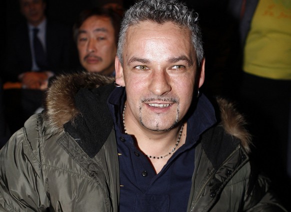 FILE - In this Feb. 25, 2009 file photo, Italian soccer legend Roberto Baggio is seen prior to the Luciano Soprani Fall/Winter 2009/2010 fashion collection, presented in Milan, Italy. Baggio is this y ...