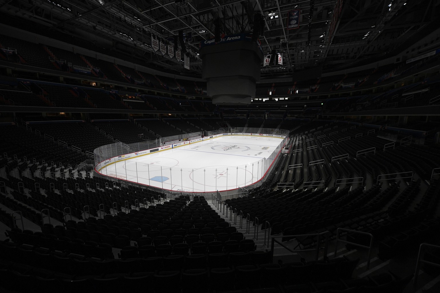 FILE - In this March 12, 2020, file photo, the Capital One Arena, home of the Washington Capitals NHL hockey club, sits empty in Washington. With no games being played, recent sports headlines have ce ...