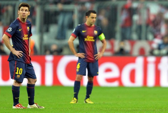 epa03674532 Barcelona players (L-R) Lionel Messi, Xavi Hernandez and Alexis Sanchez show their dejection during the UEFA Champions League semi final first leg soccer match between FC Bayern Munich and ...