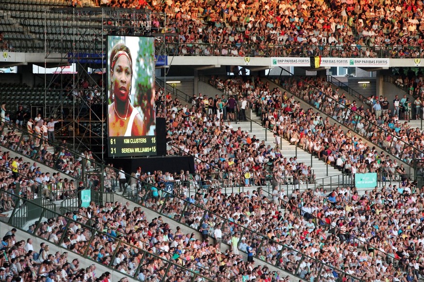 U.S. Serena Williams is seen on a giant screen during an exhibition match &quot;Best of Belgium&quot; against Belgium&#039;s Kim Clijsters at the King Baudouin stadium in Brussels, Thursday July 8, 20 ...