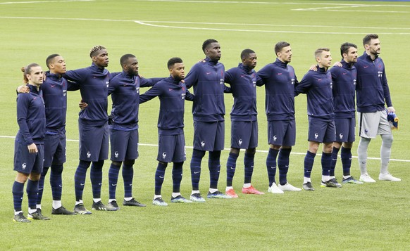 France starting players pose for a team photo at the beginning of the World Cup 2022 group D qualifying soccer match between Kazakhstan and France at the Astana Arena stadium in Nur-Sultan, Kazakhstan ...