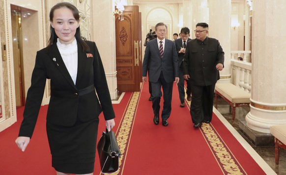 FILE - In this Sept. 18, 2018, file photo, Kim Yo Jong, left, sister of North Korean Leader, walks ahead of South Korean President Moon Jae-in and North Koran leader Kim Jong Un, right, arrive at the  ...