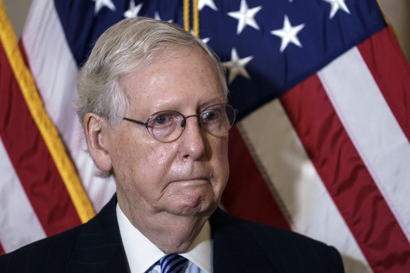Senate Majority Leader Mitch McConnell, R-Ky., pauses as he talks to reporters after the Republican Conference held leadership elections, on Capitol Hill in Washington, Tuesday, Nov. 10, 2020. (AP Pho ...