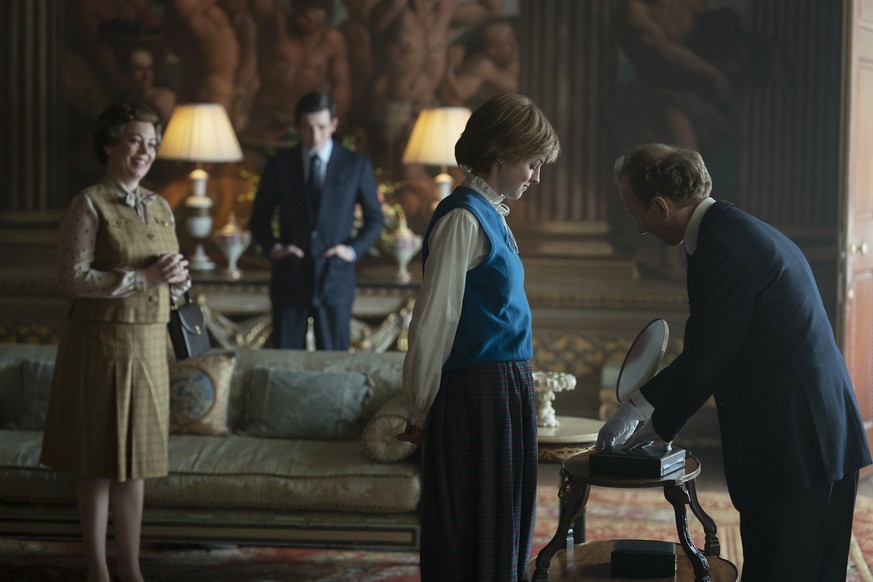 This image released by Netflix shows Olivia Colman, from left, Josh O&#039;Connor and Emma Corrin in a scene from &quot;The Crown.&quot; Season four premieres on Sunday, Nov. 15. (Des Willie/Netflix v ...