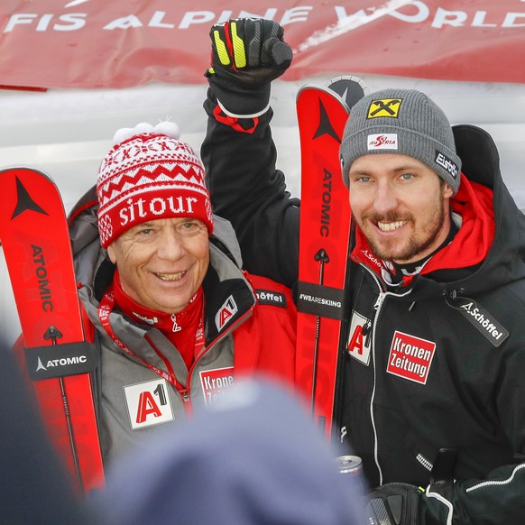 epa07377315 Marcel Hirscher of Austria (R) celebrates with Peter Schroecksnadel, President of the Austrian Ski Federation, after winning the Men&#039;s Slalom race at the 2019 FIS Alpine Skiing World  ...