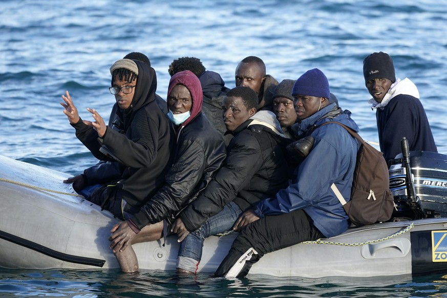 DOVER, ENGLAND - SEPTEMBER 06: Nine migrants drift in the English Channel after their engine failed on September 06, 2020 in Dover, England. The nine male migrants were making their way to the South C ...