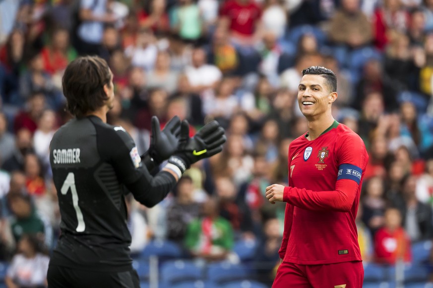 epa07628642 Portugal&#039;s Cristiano Ronaldo (R) reacts next to Swiss goalkeeper Yann Sommer (L) during the UEFA Nations League semi final soccer match between Portugal and Switzerland at the Dragao  ...