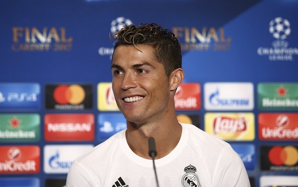 epa06009455 A handout photo made available by the UEFA shows Christiano Ronaldo of Real Madrid addressing to media after the UEFA Champions League final between Juventus FC and Real Madrid at the Nati ...