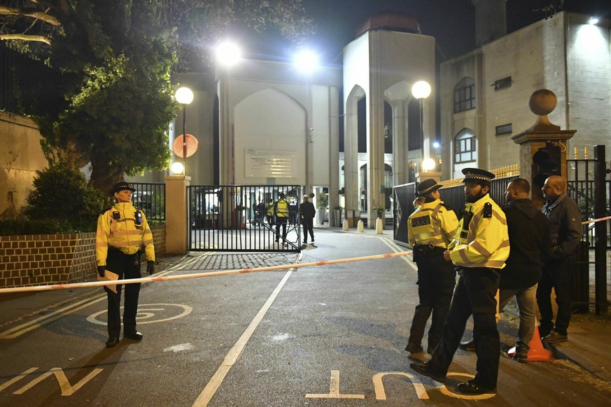 Police stage outside the London Central Mosque, near Regent&#039;s Park, in London, after a man was found with stab injuries in a nearby street, late Thursday, March 28, 2019. (Dominic Lipinski/PA via ...
