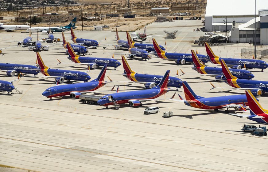 epa07728406 Southwest Airlines Boeing 737 Max aircraft sit parked on the tarmac of Southern California Logistics Airport in Victorville, California, USA, 19 July 2019. According to media reports, Sout ...