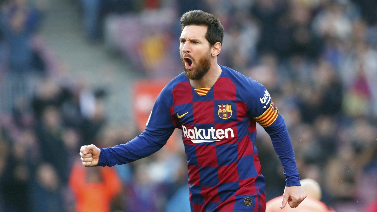 Barcelona&#039;s Lionel Messi celebrates after scoring his side&#039;s opening goal during a Spanish La Liga soccer match between Barcelona and Eibar at the Camp Nou stadium in Barcelona, Spain, Satur ...