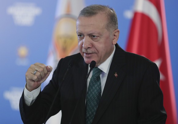 Turkish President Recep Tayyip Erdogan addresses his ruling party members via remote connection from Ankara, Turkey, Wednesday, Feb. 3, 2021. Erdogan has denounced student protesters as