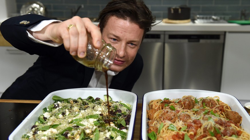 epa05615463 (FILE) A file photograph showing British Celebrity chef Jamie Oliver helping out at Jamie&#039;s Ministry of Food in Sydney Australia, 30 March 2015. Media reports on 03 November 2016 stat ...