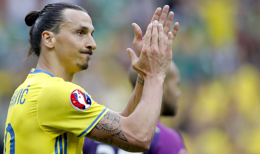 FILE - In this Monday, June 13, 2016 file photo, Sweden&#039;s Zlatan Ibrahimovic applauds during the Euro 2016 Group E soccer match between Ireland and Sweden at the Stade de France in Saint-Denis, n ...