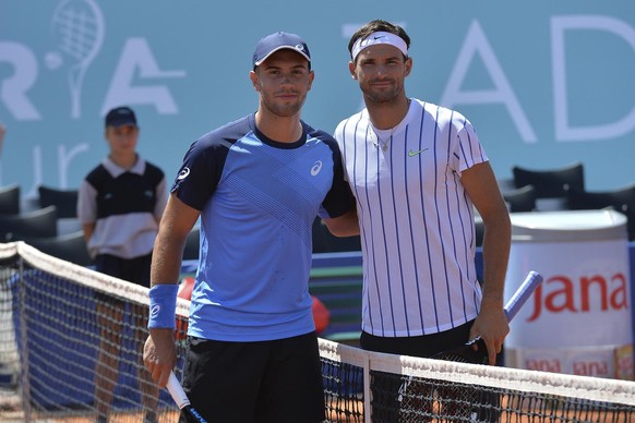 In this photo taken Saturday, June 20, 2020, Bulgaria&#039;s Grigor Dimitrov, right, poses for cameras with Croatia&#039;s Borna Coric during their semifinal match at a tournament in Zadar, Croatia. D ...