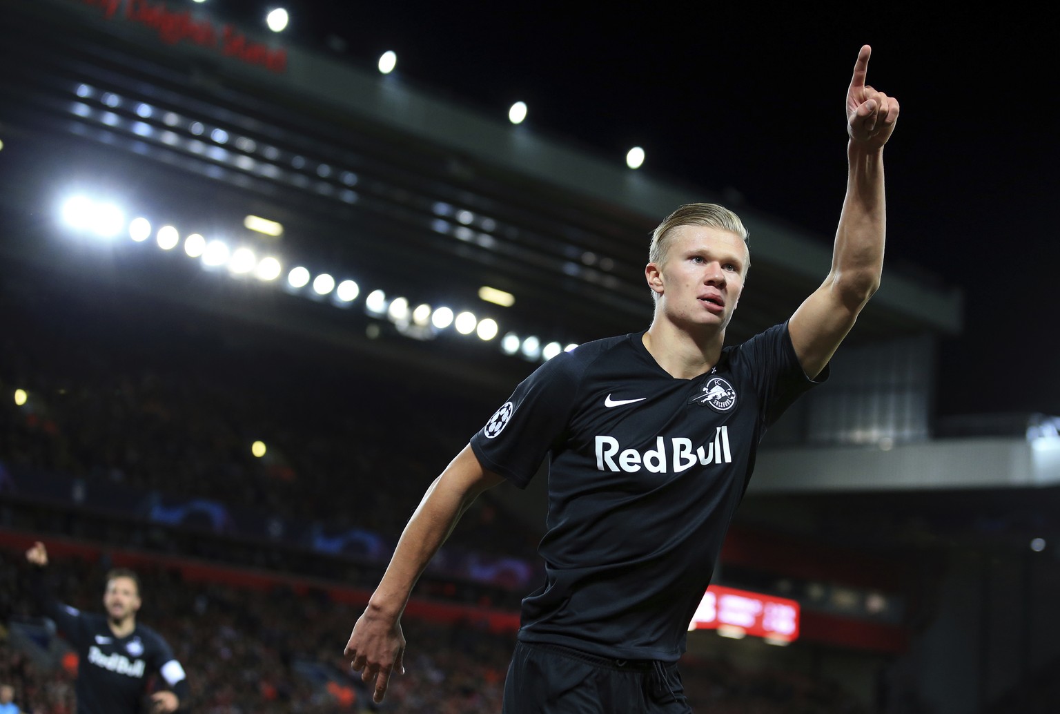Salzburg&#039;s Erling Braut Haland celebrates after scoring his side&#039;s third goal during the Champions League group E soccer match between Liverpool and Red Bull Salzburg at Anfield stadium in L ...