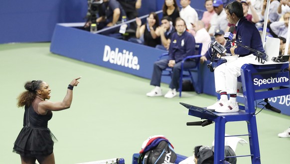 epa07007149 Serena Williams of the US gestures towards chair umpire Carlos Ramos (R) as she plays Naomi Osaka of Japan during the women&#039;s final on the thirteenth day of the US Open Tennis Champio ...