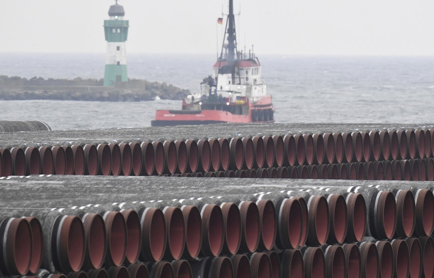 Pipes for the Nord Stream 2 Baltic Sea gas pipeline are stored on the premises of the port of Mukran near Sassnitz, Germany, Friday, Dec. 4, 2020. The port of Mukran on the island of Ruegen is conside ...