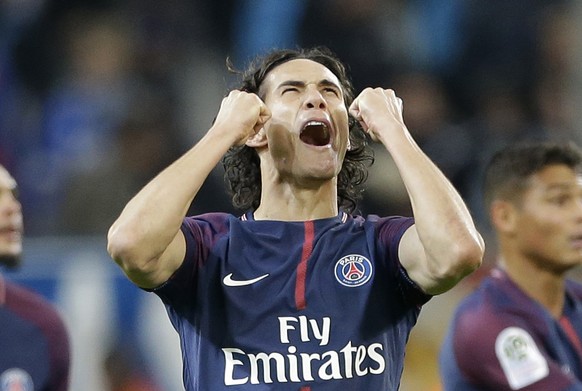 PSG&#039;s Edinson Cavani, celebrates after scoring during the League One soccer match between Marseille and Paris Saint-Germain, at the Velodrome stadium, in Marseille, southern France, Sunday, Oct.  ...
