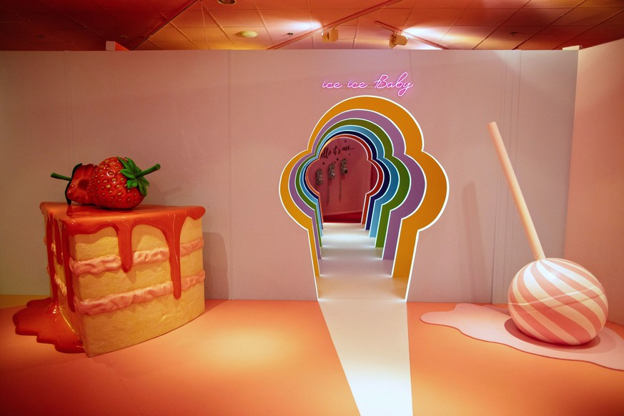 epa09014613 A giant piece of cake and a lollipop in the Museum of Happiness and Illusion - Be Happy! Museum, located in the Reduta Shopping Center in Warsaw, Poland, 15 February 2021. On the area of 8 ...