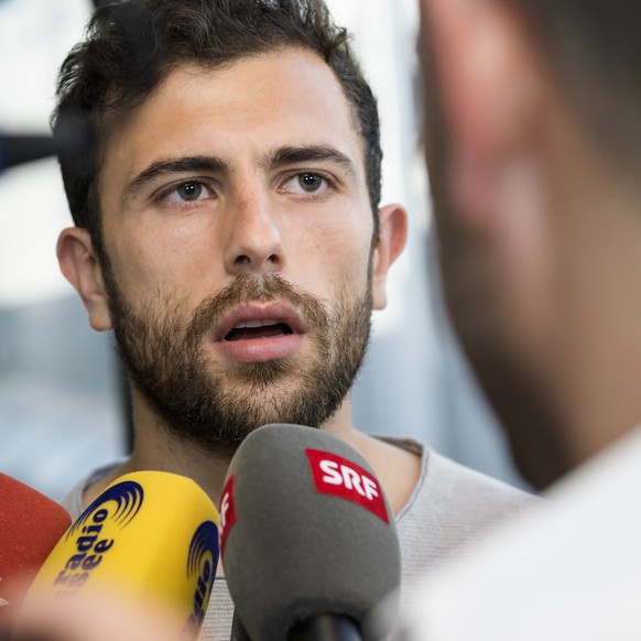 Switzerland&#039;s midfielder Admir Mehmedi speaks to journalists at the Lisbon Airport, in Lisbon, Portugal, Wednesday, October 11, 2017. Switzerland lost against Portugal in yesterday&#039;s Fifa Wo ...