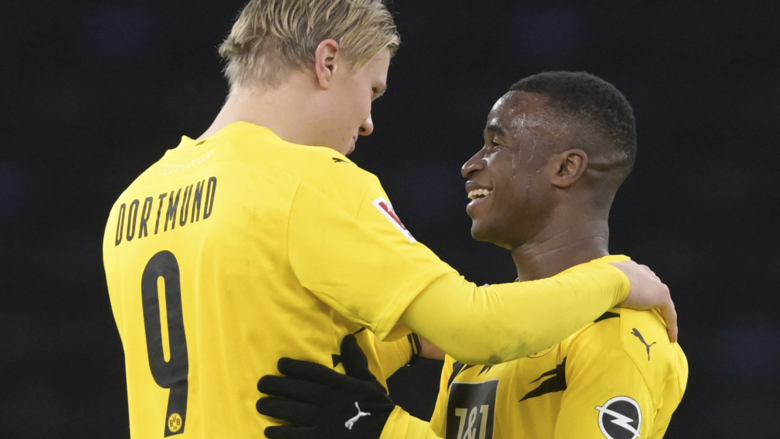 Dortmund&#039;s Erling Haaland (l) and Youssoufa Moukoko hug each other after the end of the game a German Bundesliga soccer match between Hertha BSC Berlin and Borussia Dortmund in Berlin, Geremany,  ...