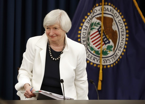 FILE - In this Wednesday, Sept. 20, 2017, file photo, Federal Reserve Chair Janet Yellen gets up from her seat at the conclusion of a news conference following the Federal Open Market Committee meetin ...