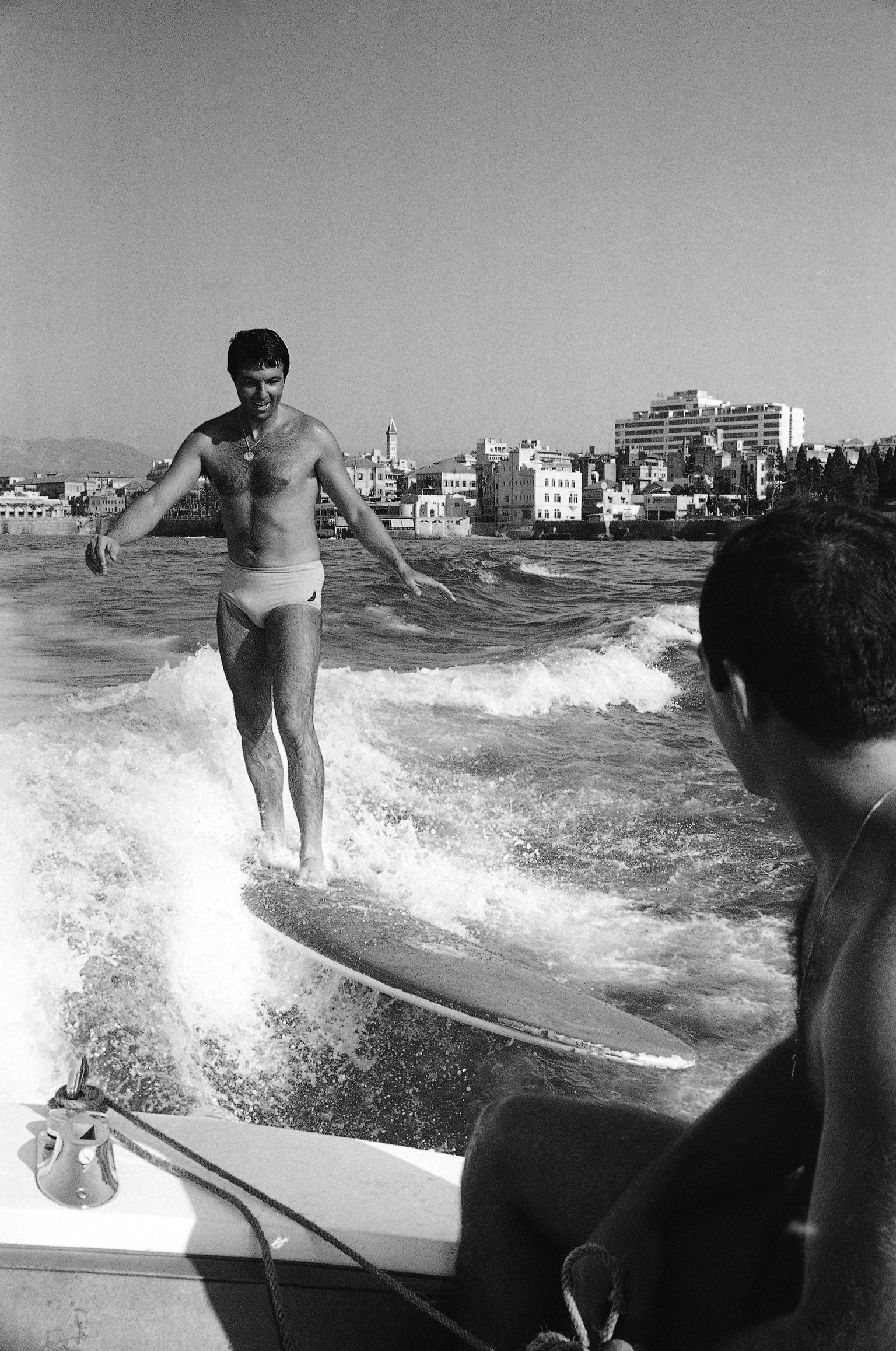 Eddy Arida, a young Lebanese executive surfing off the Mediterranean coast of Beirut, Lebanon on August 25, 1965. Instead of riding the waves, Arida rides the wake of a speedboat, like a water-skier w ...