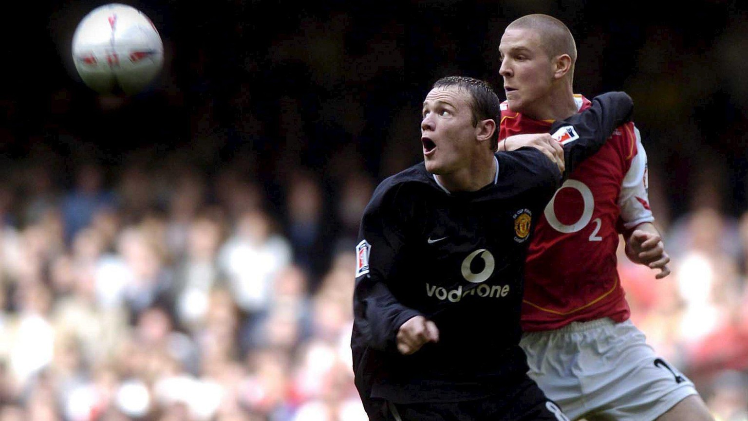 Wayne Rooney (L) of Manchester United battles with Philippe Senderos of Arsenal, 21 May 2005, during the Arsenal v Manchester United FA Cup Final at the Millennium Stadium, Cardiff, Wales, United King ...
