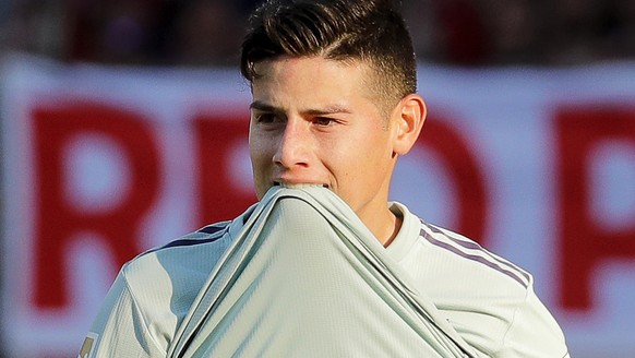 epa07473557 Bayern&#039;s James Rodriguez reacts during the German Bundesliga soccer match between SC Freiburg and FC Bayern Munich in Freiburg, Germany, 30 March 2019. EPA/RONALD WITTEK CONDITIONS -  ...