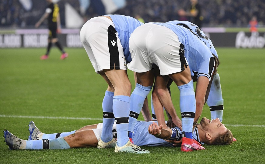 Lazio&#039;s Ciro Immobile, on the ground, celebrates with his teammates after he scored his side&#039;s first goal during the Serie A soccer match between Lazio and inter Milan, at Rome&#039;s Olympi ...