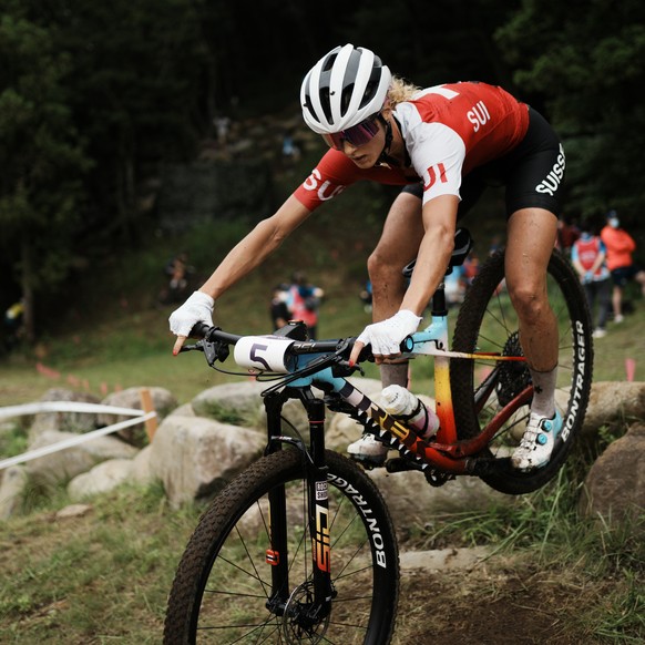 Jolanda Neff of Switzerland competes during the women&#039;s cross-country mountain bike competition at the 2020 Summer Olympics, Tuesday, July 27, 2021, in Izu, Japan. (AP Photo/Thibault Camus)