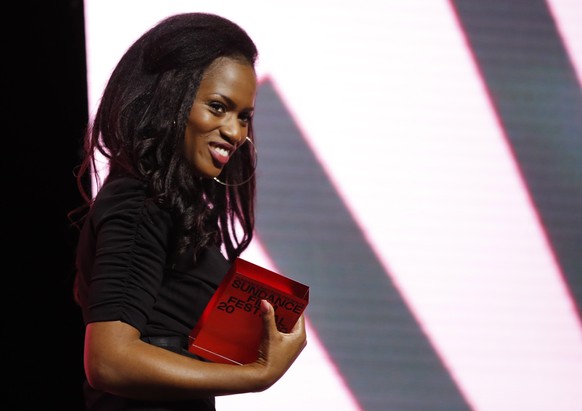 epa08186739 French director Maimouna Doucoure accepts the World Cinema Dramatic Directing Award for the movie &#039;Cuties&#039; at the 2020 Sundance Film Festival awards night in Park City, Utah, USA ...