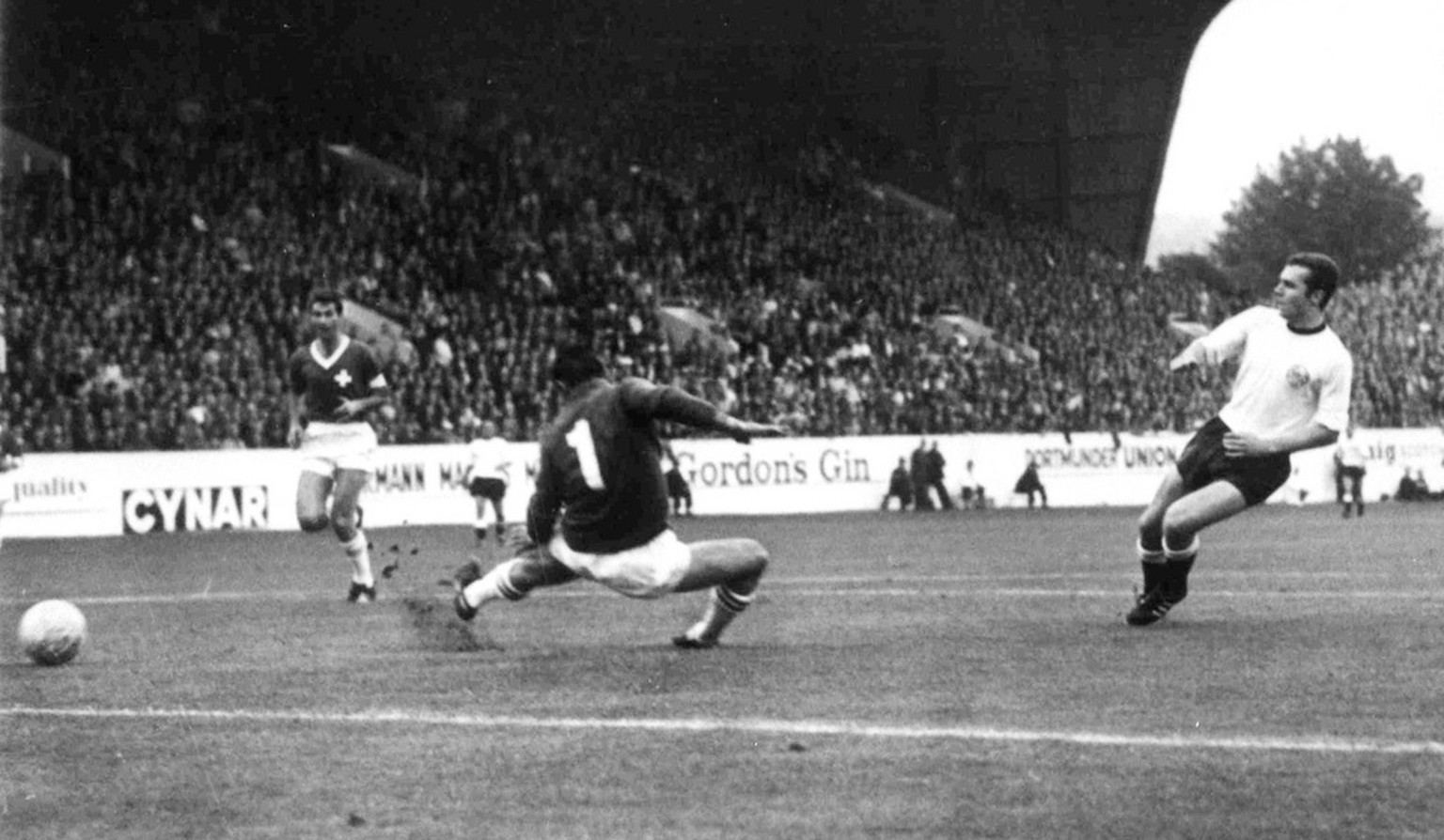 West Germany&#039;s Franz Beckenbauer, right, scores his teams fourth goal against Switzerland in the Football World Cup match at Hillsborough Stadium, Sheffield, on July 12, 1966. Swiss goalkeeper Ch ...