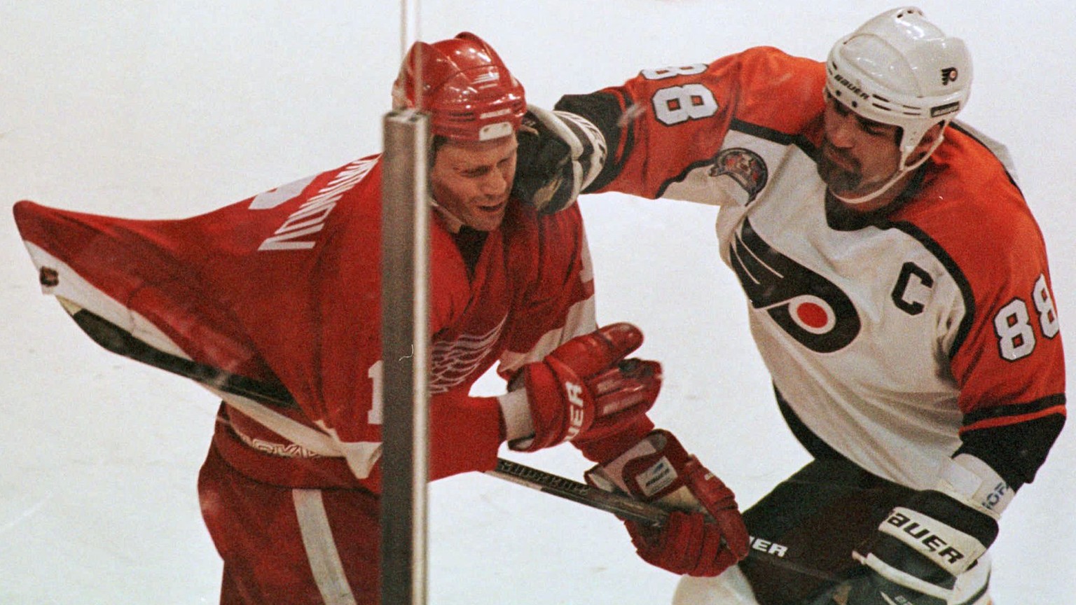 In this May 31, 1997 file photo Philadelphia Flyers Eric Lindros roughs up Detroit Red Wings Vladimir Konstantinov during the final minutes of Detroit&#039;s 4-2 victory over the Flyers in Game 1 of t ...