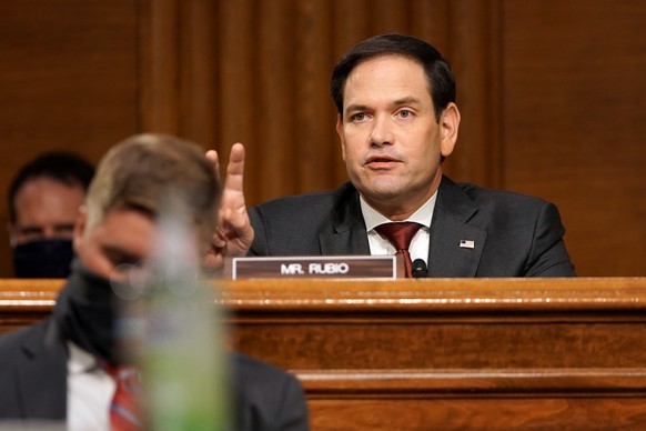epa08574631 US Senator Marco Rubio (R-Fla.) asks a question to Secretary of State Mike Pompeo during a Senate Foreign Relations Committee hearing to discuss the Trump administration&#039;s FY 2021 bud ...