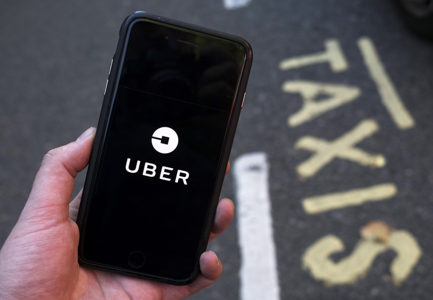 epa08024131 (FILE) - An image showing an Uber app on a mobile phone in central London, Britain, 22 September 2017 (re-issued 25 November 2019). Media reports on 25 November 2019 state the Transport fo ...