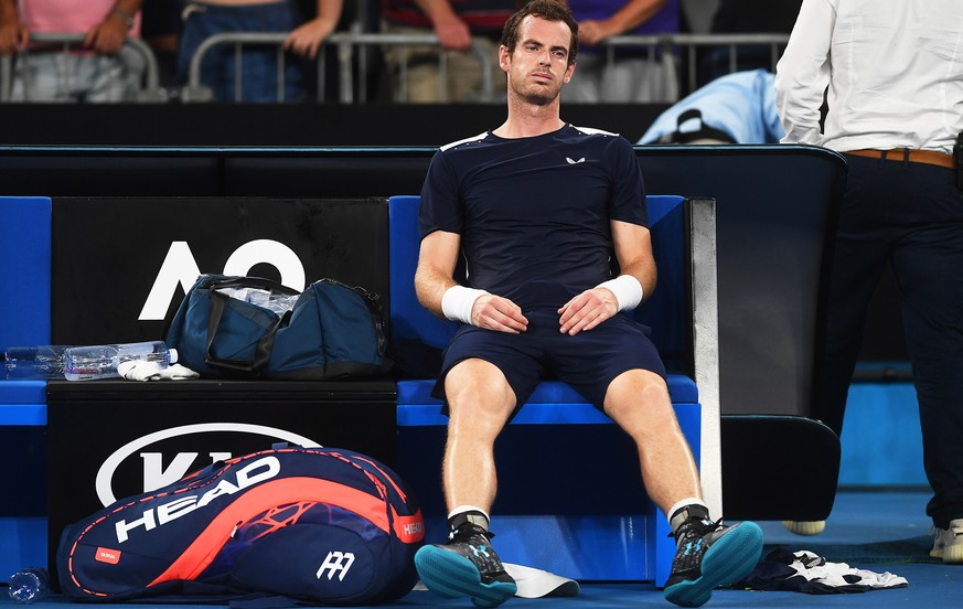 epa07282950 Andy Murray of Britain reacts after losing his first round match against Roberto Bautista Agut of Spain at the Australian Open tennis tournament in Melbourne, Australia, 14 January 2019. E ...