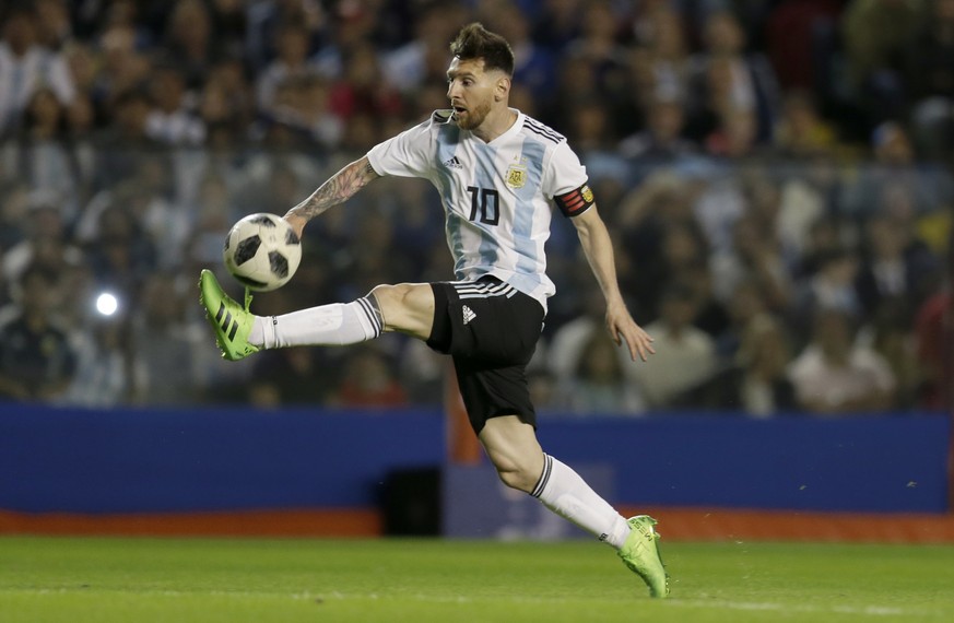 In this May 29, 2018 photo, Argentina&#039;s Lionel Messi controls the ball during a friendly soccer match between Argentina and Haiti at the Bombonera stadium in Buenos Aires, Argentina. Argentina wo ...