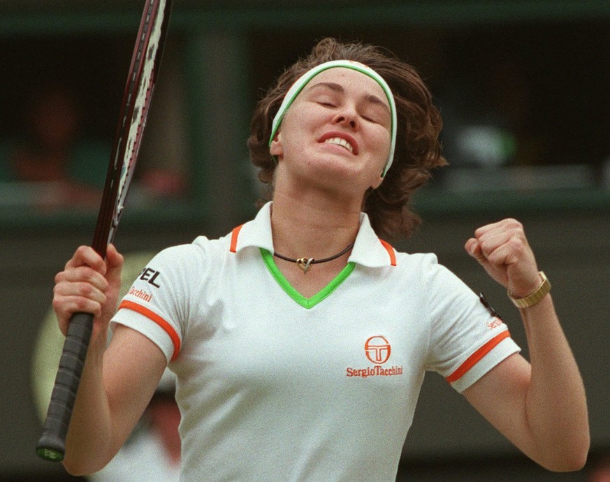 Martina Hingis reacts after defeating Denisa Chadlikova in their Women&#039;s Singles quarter final match on the Centre Court at Wimbledon, July 2, 1997. Later she also won the final of the tournament ...