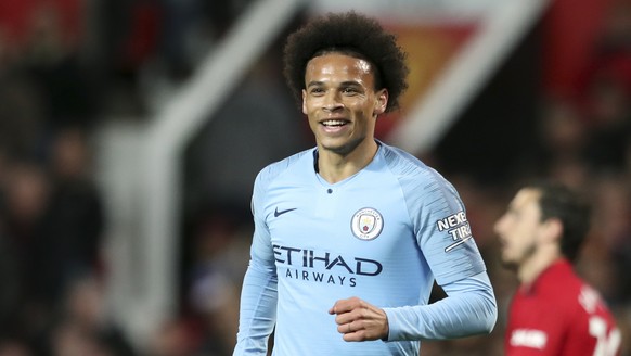 Manchester City&#039;s Leroy Sane celebrates after scoring his side&#039;s second goal during the English Premier League soccer match between Manchester United and Manchester City at Old Trafford Stad ...