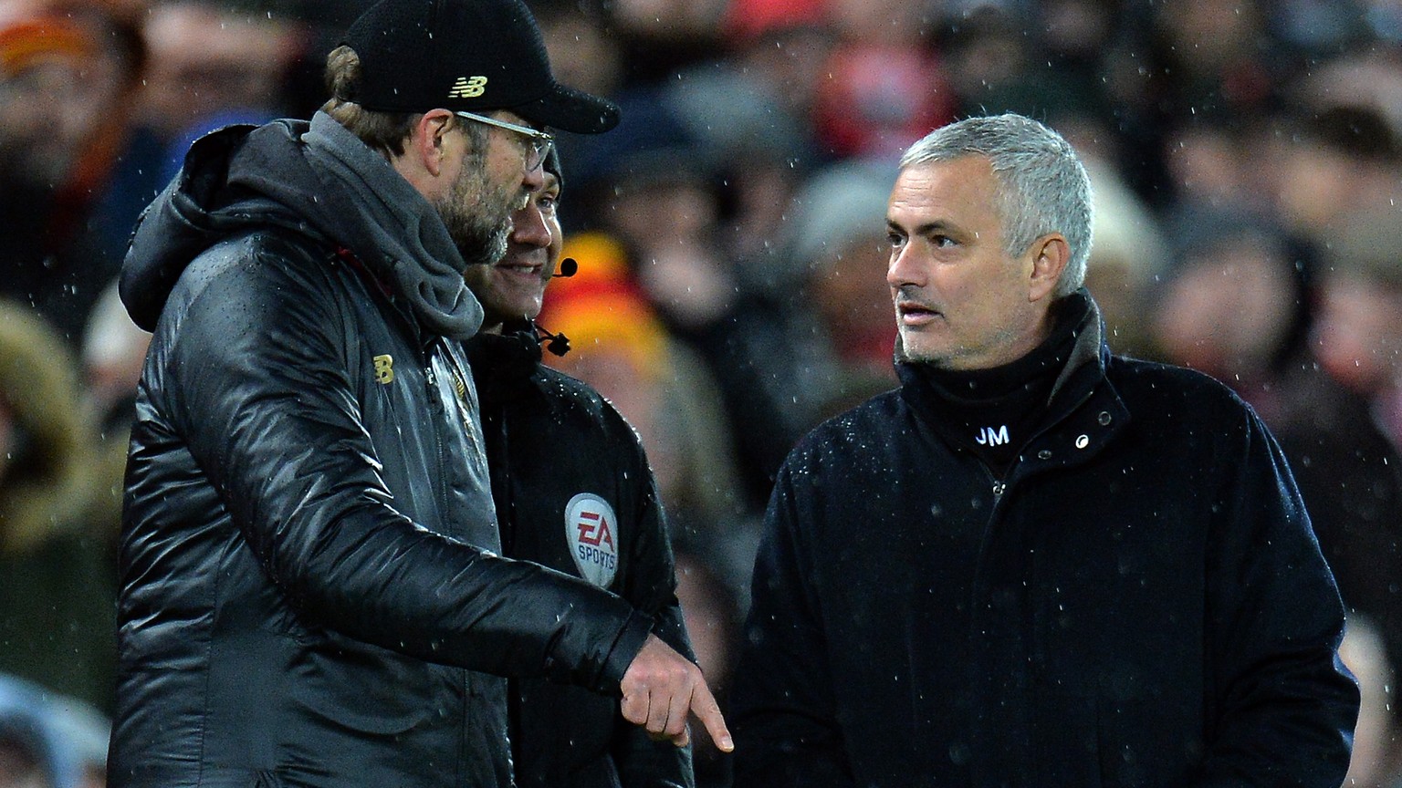 epa07235927 Manchester United manager Jose Mourinho (R) and Liverpool head coach Jurgen Klopp (L) during the English Premier League soccer match between Liverpool FC and Manchester United FC at Anfiel ...