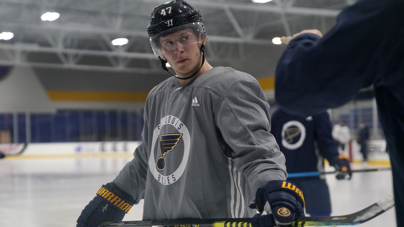 St. Louis Blues&#039; Torey Krug listens to a member of the coaching staff during NHL hockey training camp Tuesday, Jan. 5, 2021, in Maryland Heights, Mo. (AP Photo/Jeff Roberson)