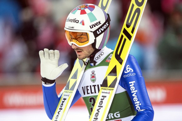 epa07233618 Kilian Peier of Switzerland reacts during the men&#039;s FIS Ski Jumping World Cup in Engelberg, Switzerland, 15 December 2018. EPA/URS FLUEELER