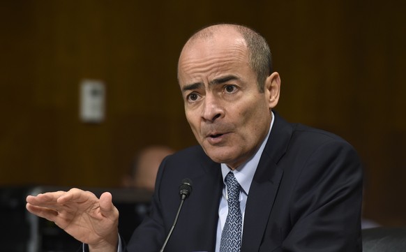 Anheuser-Busch InBev Chief Executive Officer Carlos Brito testifies before the Senate Antitrust, Competition Policy and Consumer Rights Subcommittee on Capitol Hill in Washington, Tuesday, Dec. 8, 201 ...