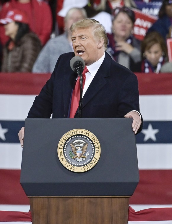 epa08865535 US President Donald J. Trump speaks during a campaign rally to support Georgia Republican Senators David Perdue and Kelly Loeffler in their upcoming runoff election at Valdosta Regional Ai ...